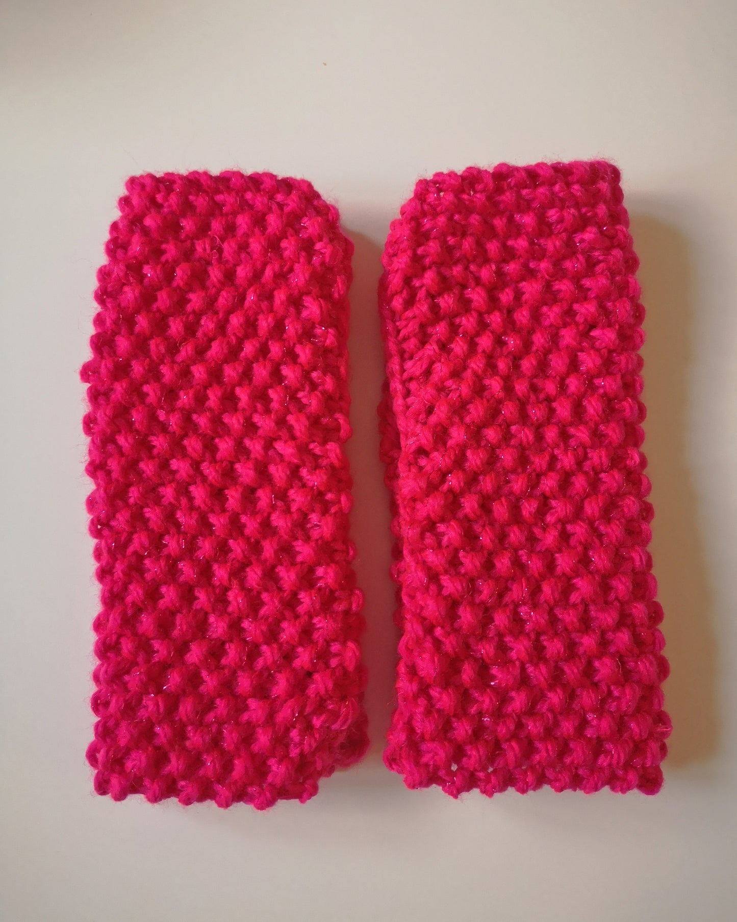 Gestrickte Handstulpen Neonpink mit Glitzer